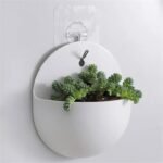 Pot de fleur suspendu élégant avec une conception de trou de suspension pratique