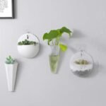 Pot de fleur suspendu élégant avec une conception de trou de suspension pratique