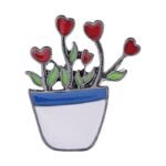 Jolie épingle émaillée De Chaton Dans Une Plante Décorative