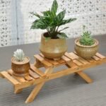 Étagère pliante en bois massif pour une décoration élégante de maison et de jardin.